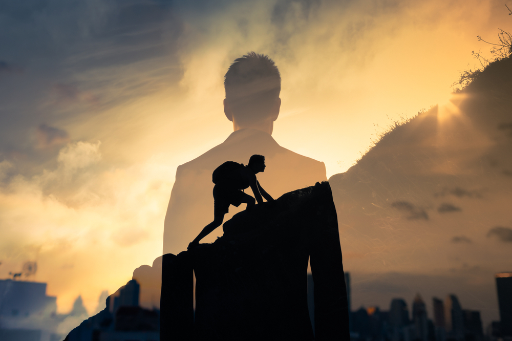 Man climbing a hill in an article on the I Am concept on PSI World
